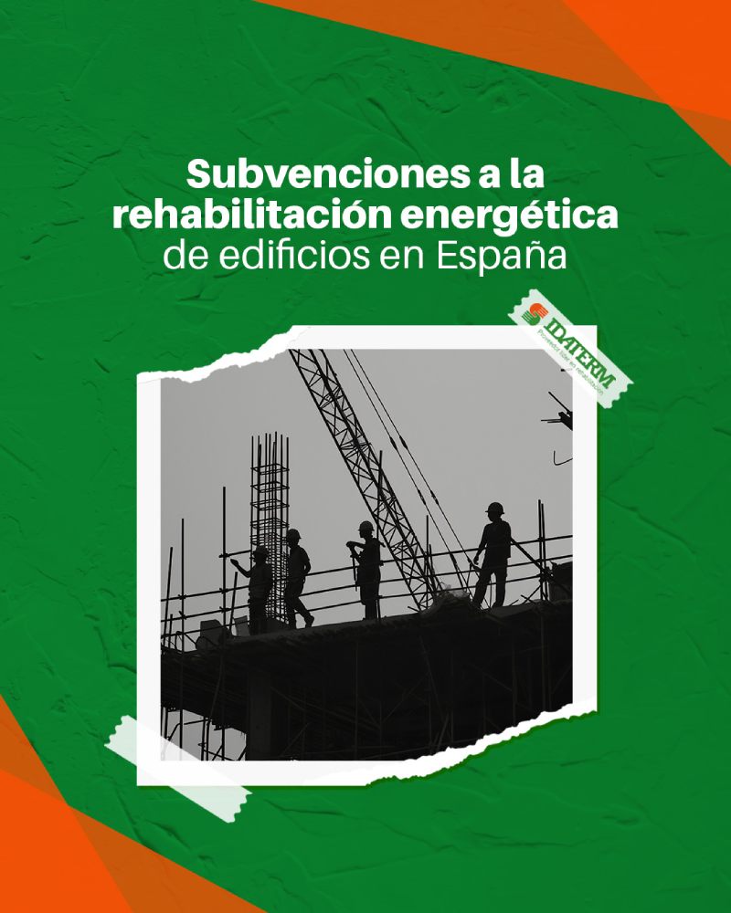 Obreros trabajando en la rehabilitación de un edificio para mejorar su eficiencia energética con ayudas de los fondos Next Generation.